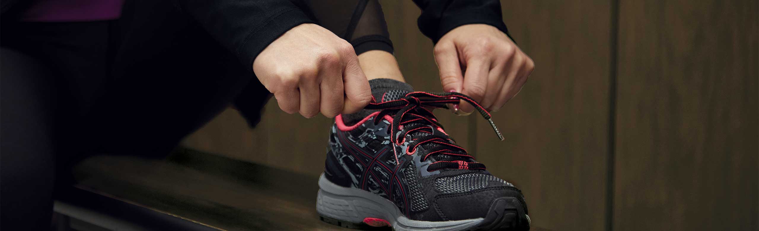 changing area flooring person tying shoes