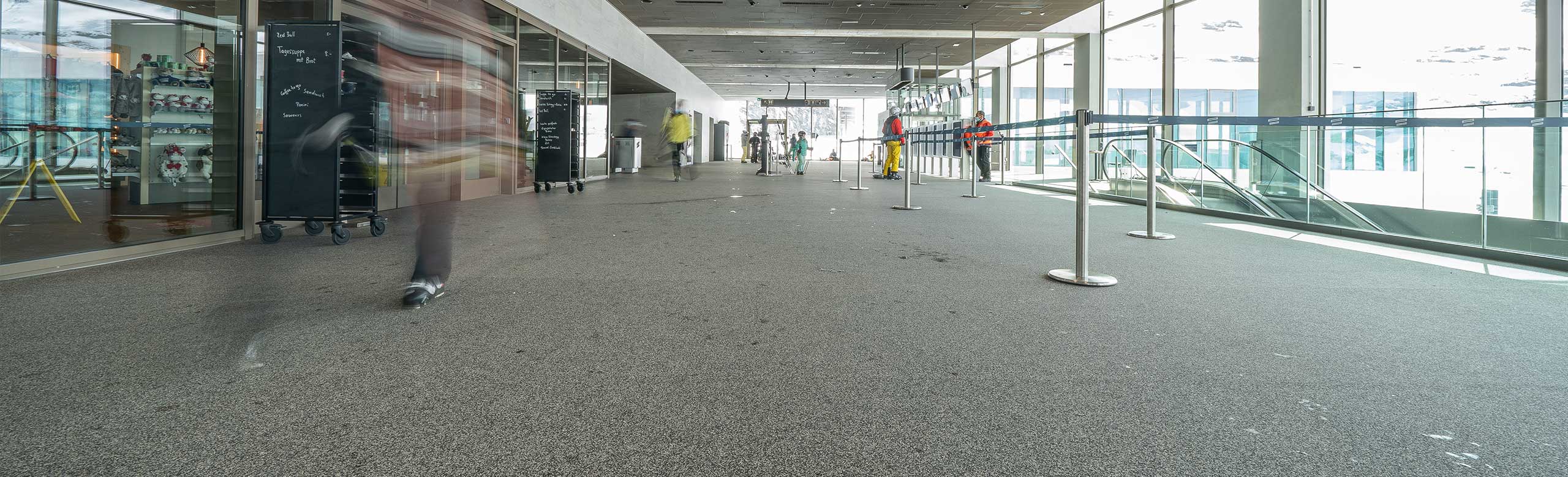 winter sports flooring, people walking in entrance area